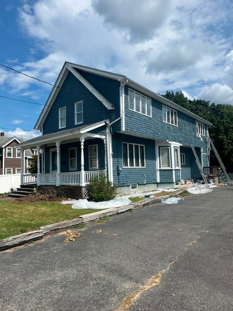 Blue house after exterior painting