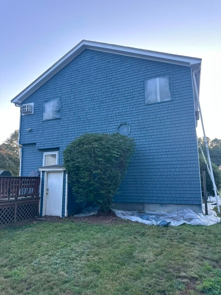 Blue house exterior after painting